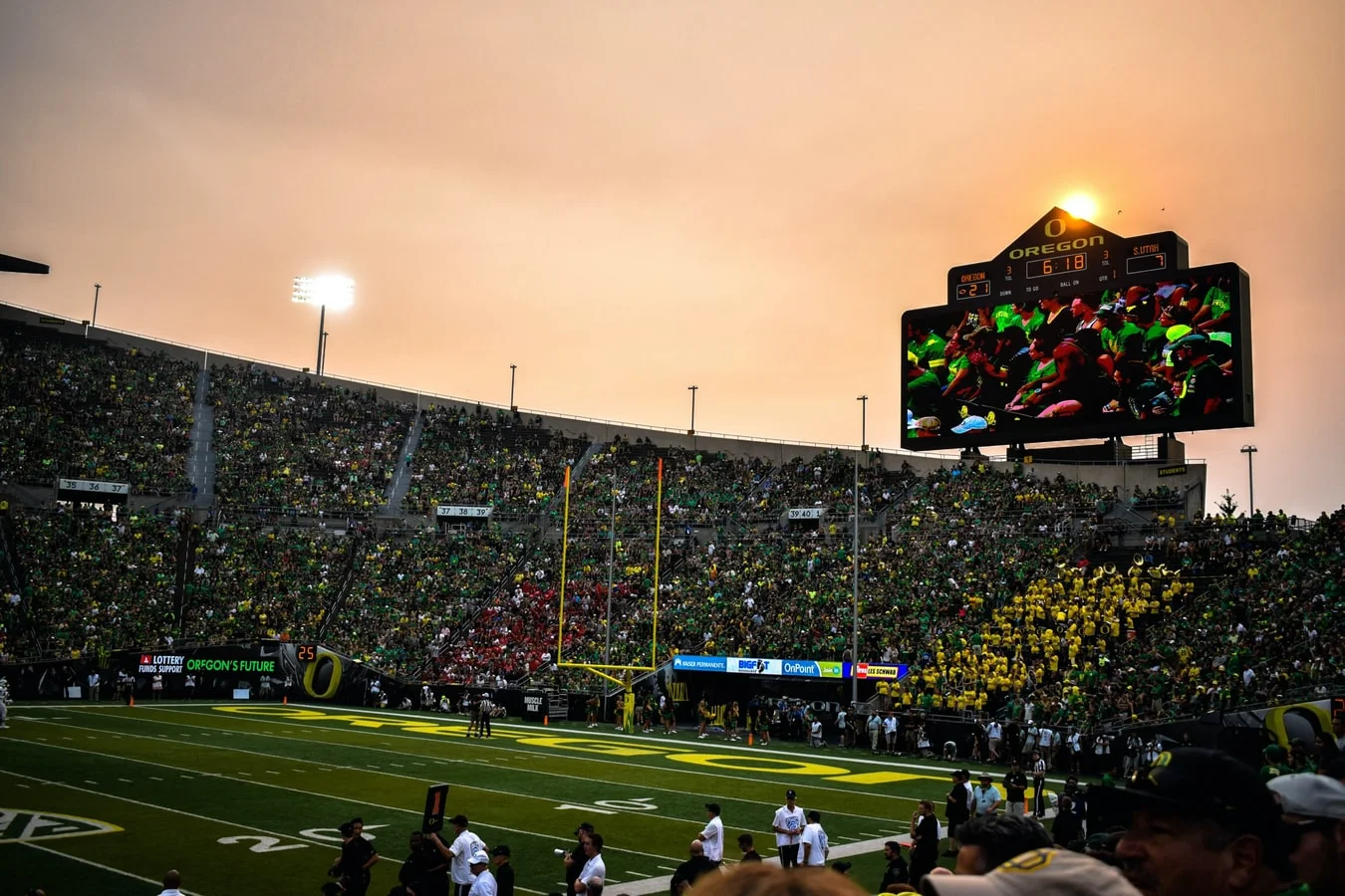 Football stadium filled with cheering fans, ready for the upcoming Big 10 season