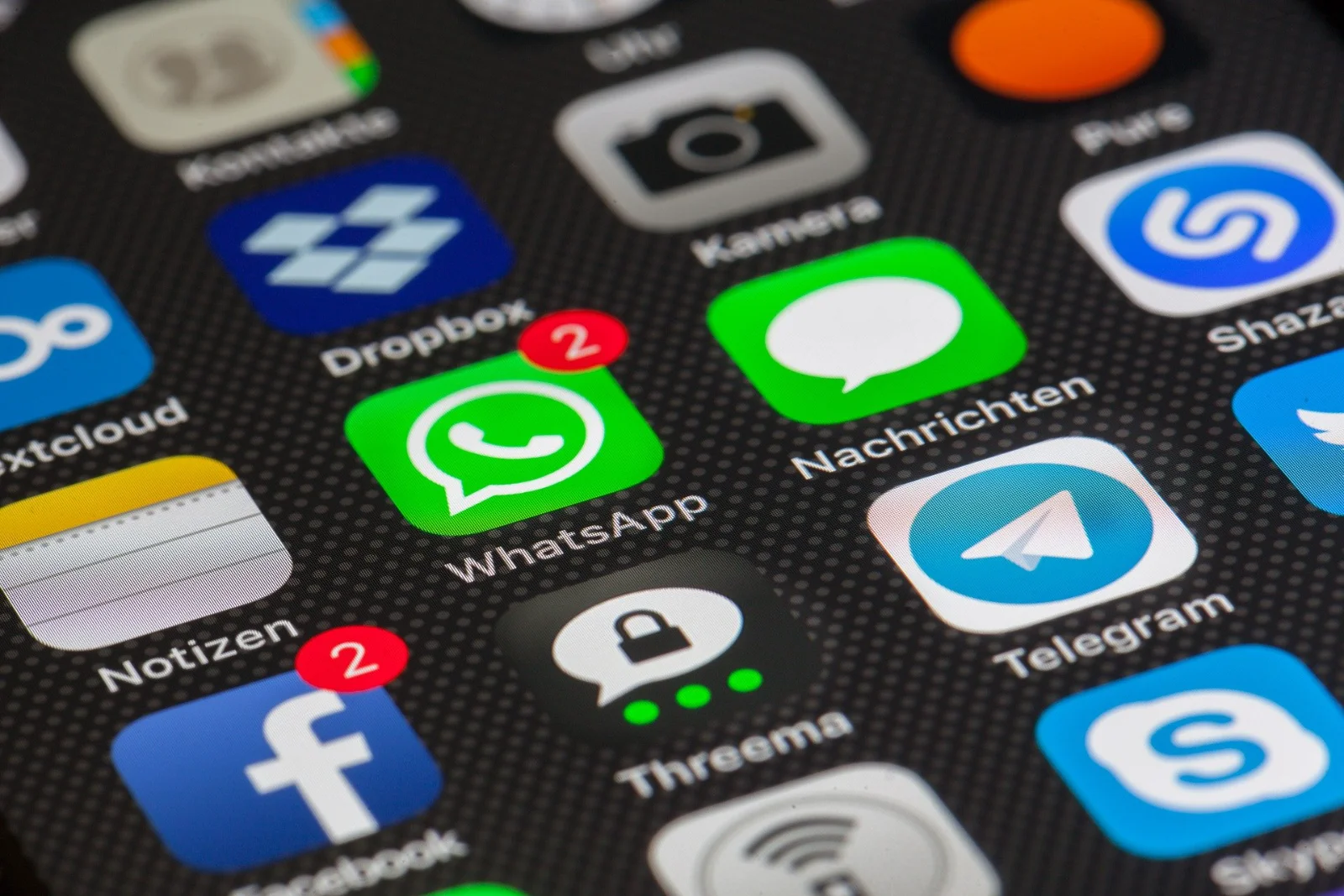 A phone displaying chat bubbles, illustrating brand interaction and engagement