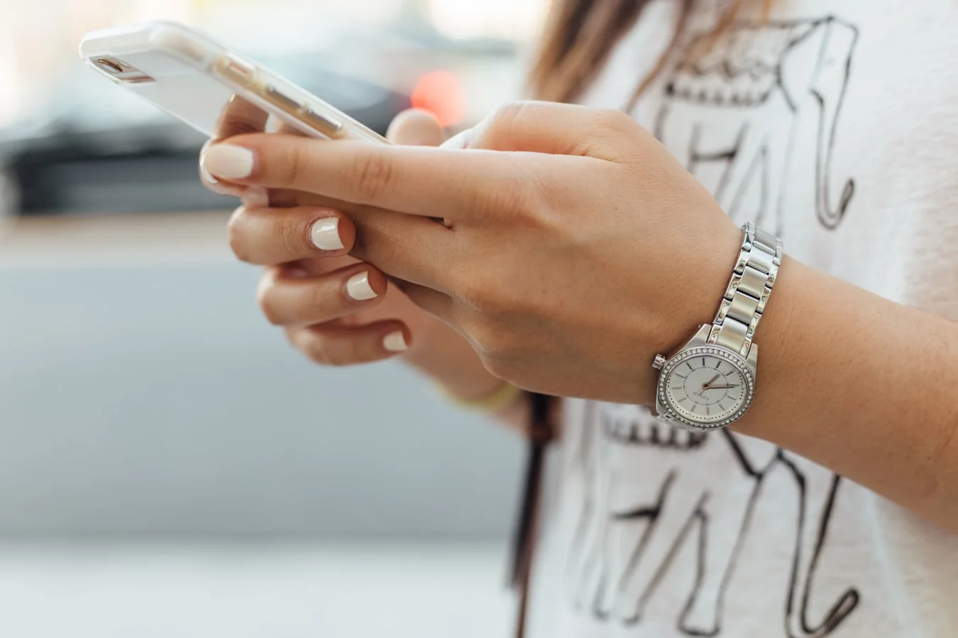 Smartphone displaying a branded text message, enhancing brand recognition and customer engagement