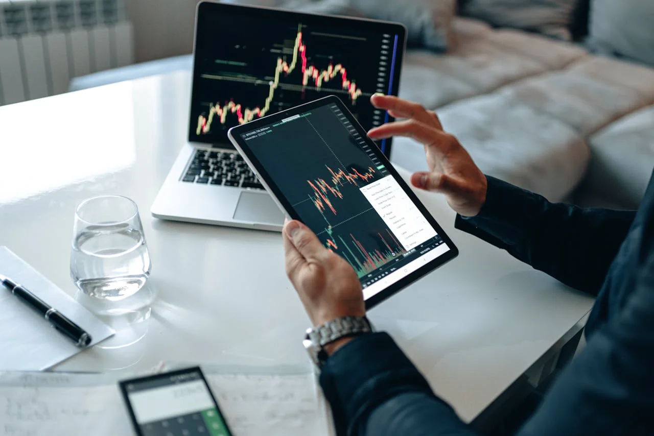 A diverse team collaborates around a table, planning a company's initial public offering future