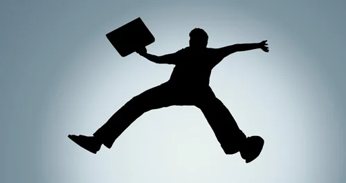 Energetic entrepreneur in a dynamic workshop, showcasing passion in their business endeavors
