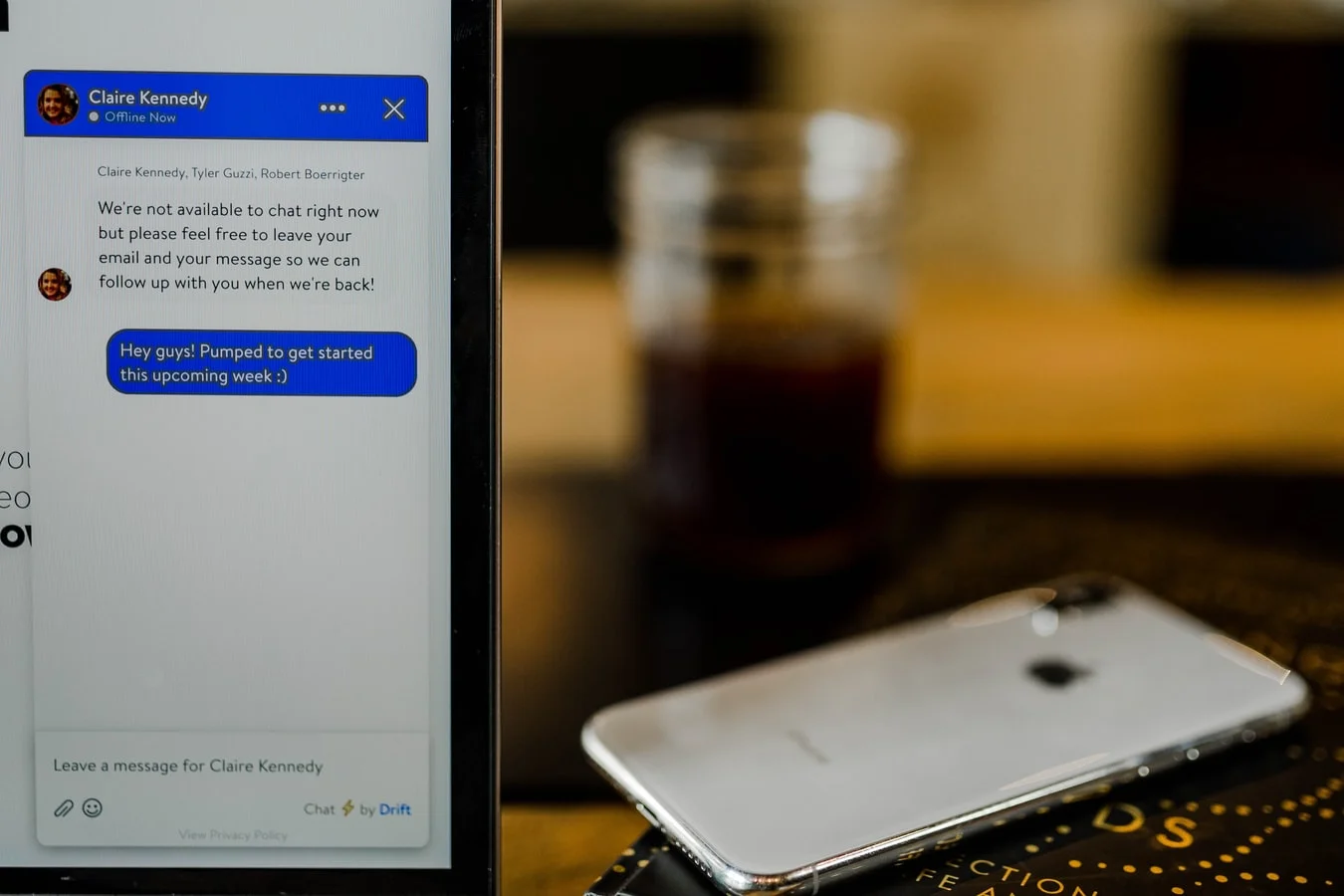 Person interacting with a chatbot on a laptop screen