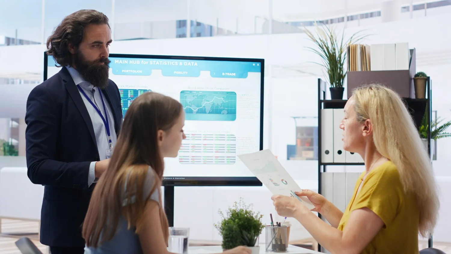 Woman looking at data on a tablet, symbolizing smart marketing choices