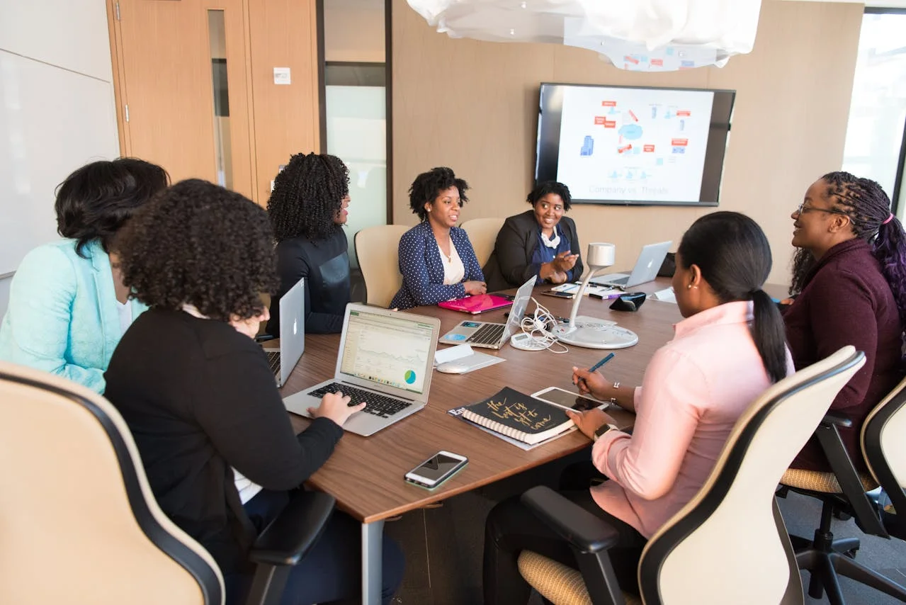 Diverse team collaborating, embodying company values for stronger brand connection