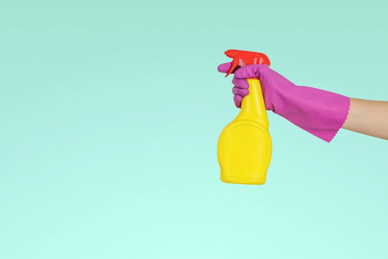Brand communication strategy shown by a person cleaning a sparkling glass surface