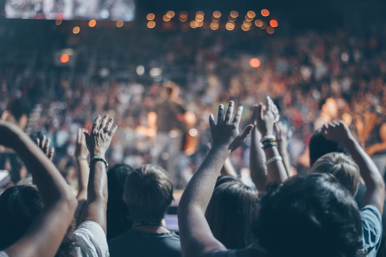 Public relations professional orchestrating a successful live concert event