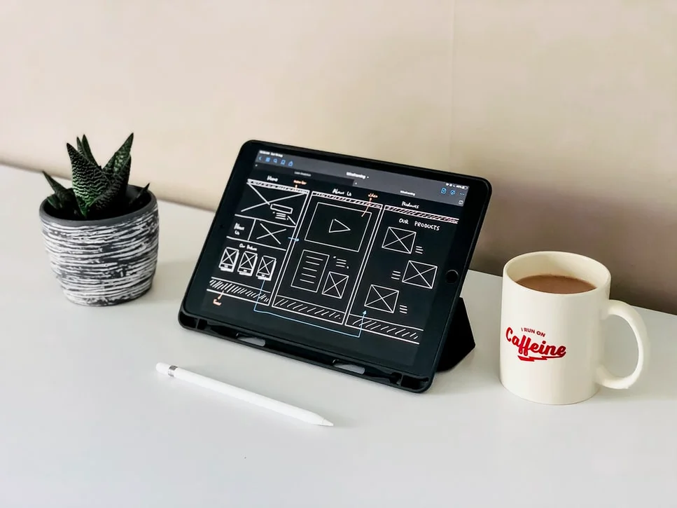 Laptop displaying a clean, well-structured website layout, showcasing effective design principles