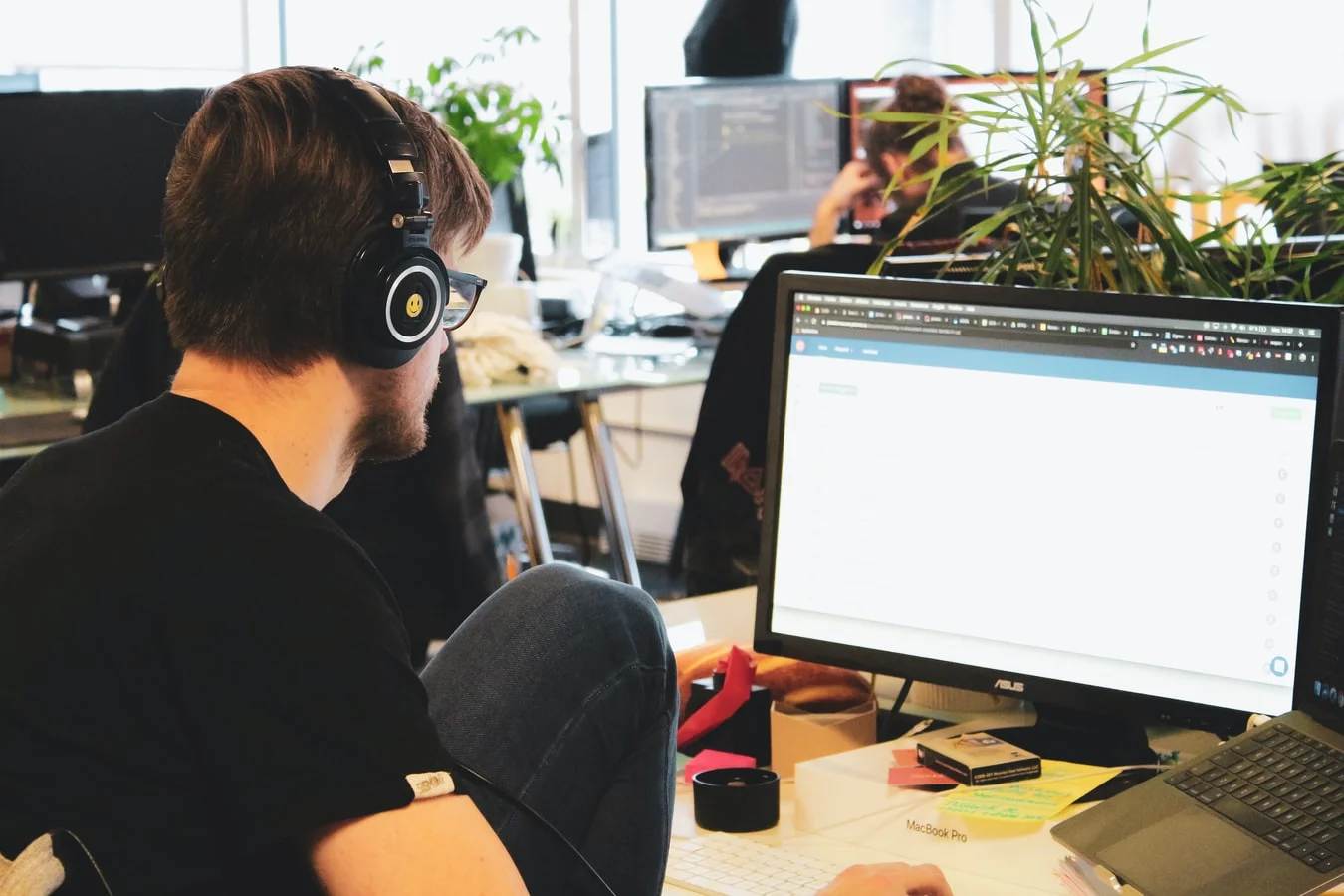 A person crafting an effective email marketing strategy on a laptop