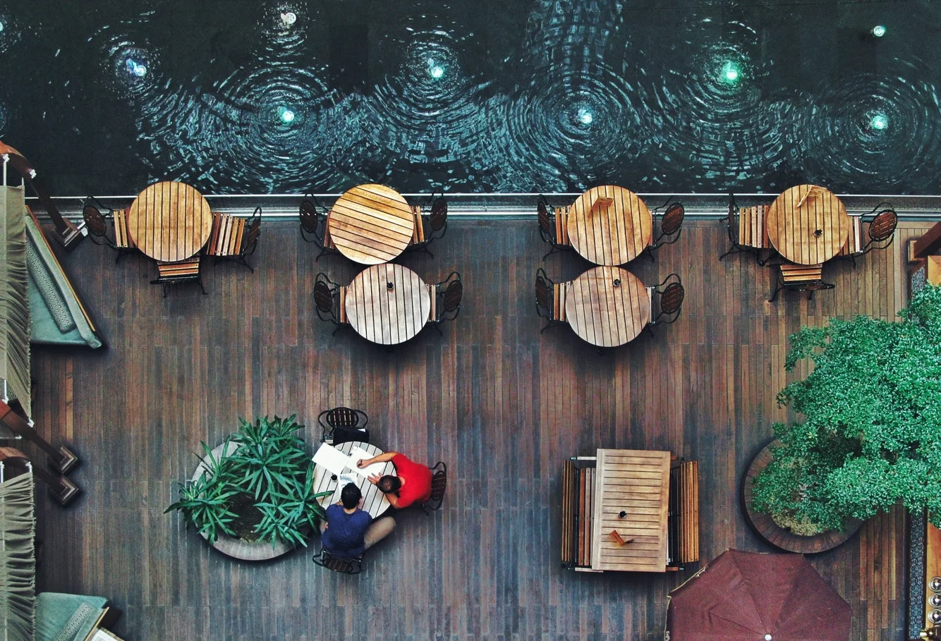Team collaborates in an office, symbolizing strategic hospitality PR brand expansion