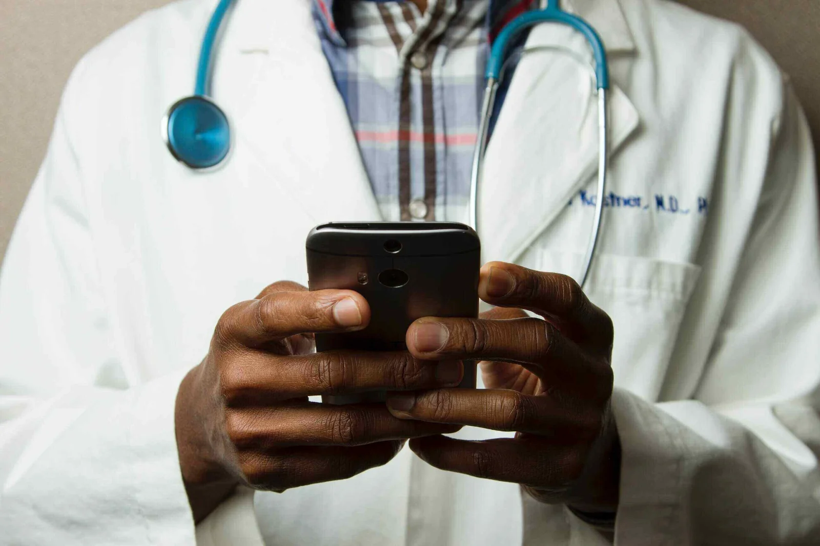 Smartphone showing health apps, illustrating technology's role in personal wellness e-commerce