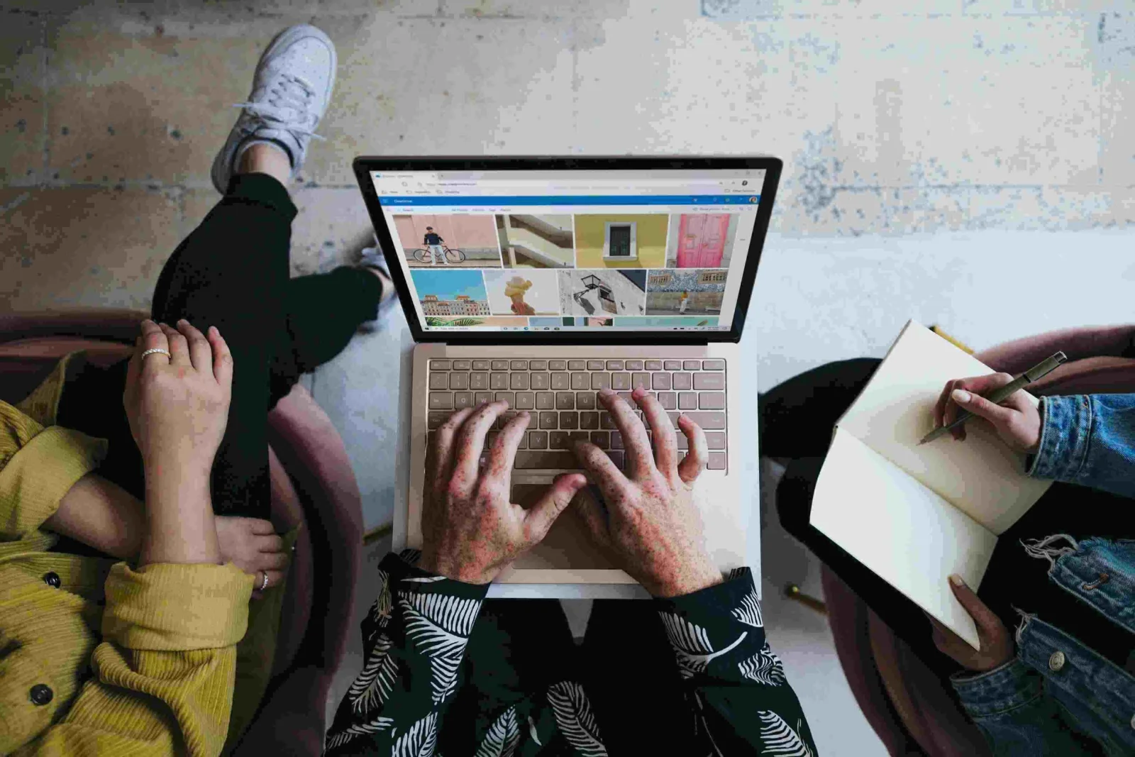 Diverse hands holding globe, challenging stereotypes with multicultural marketing strategies