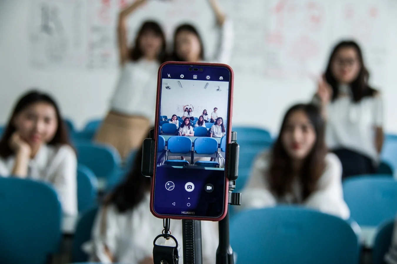 Young woman creating content on her smartphone, a symbol of authentic influencer marketing
