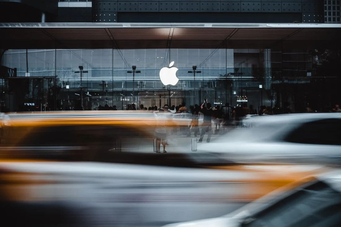 A marketing team brainstorms, learning strategies from Apple's brand success