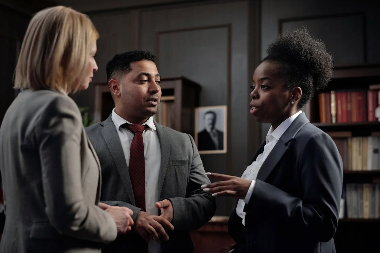 Lawyer connecting with clients through digital marketing strategies on a laptop and tablet