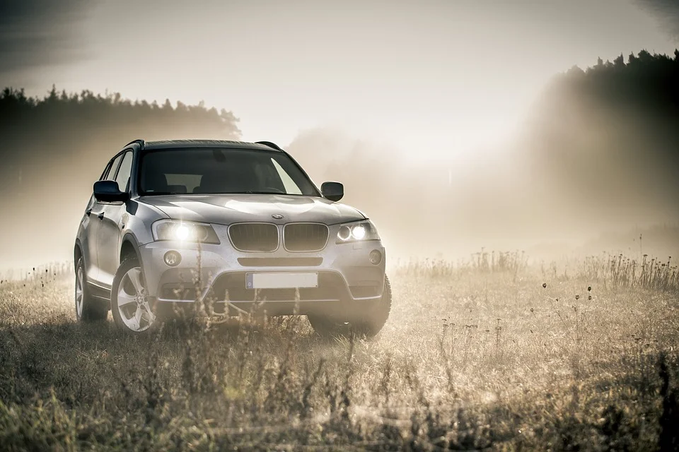 Powerful new luxury SUVs driving on a scenic open road