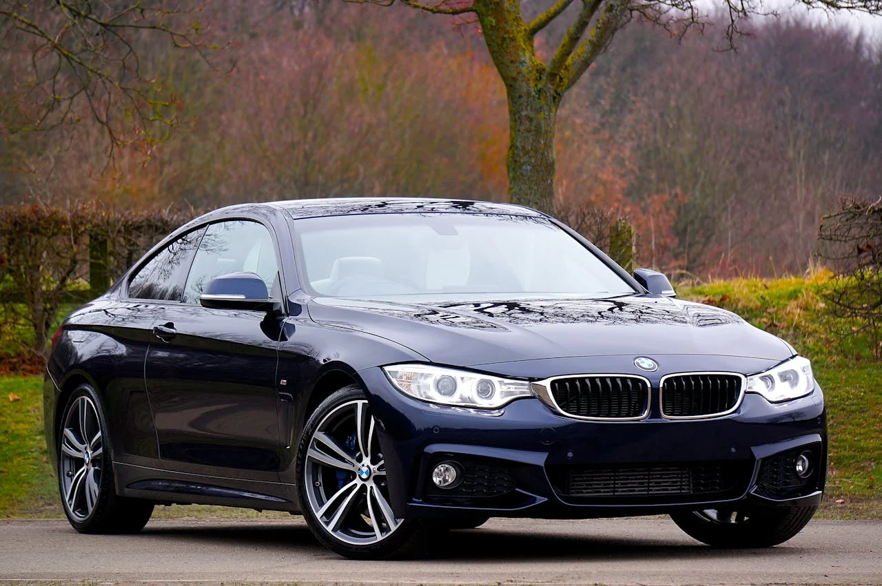 Digital email marketing strategies for automotive brands, a car driving on a road