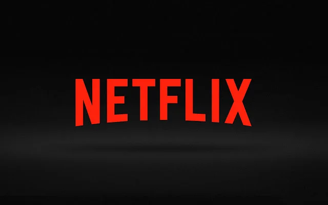 A retro television displaying classic Netflix content on a patterned background