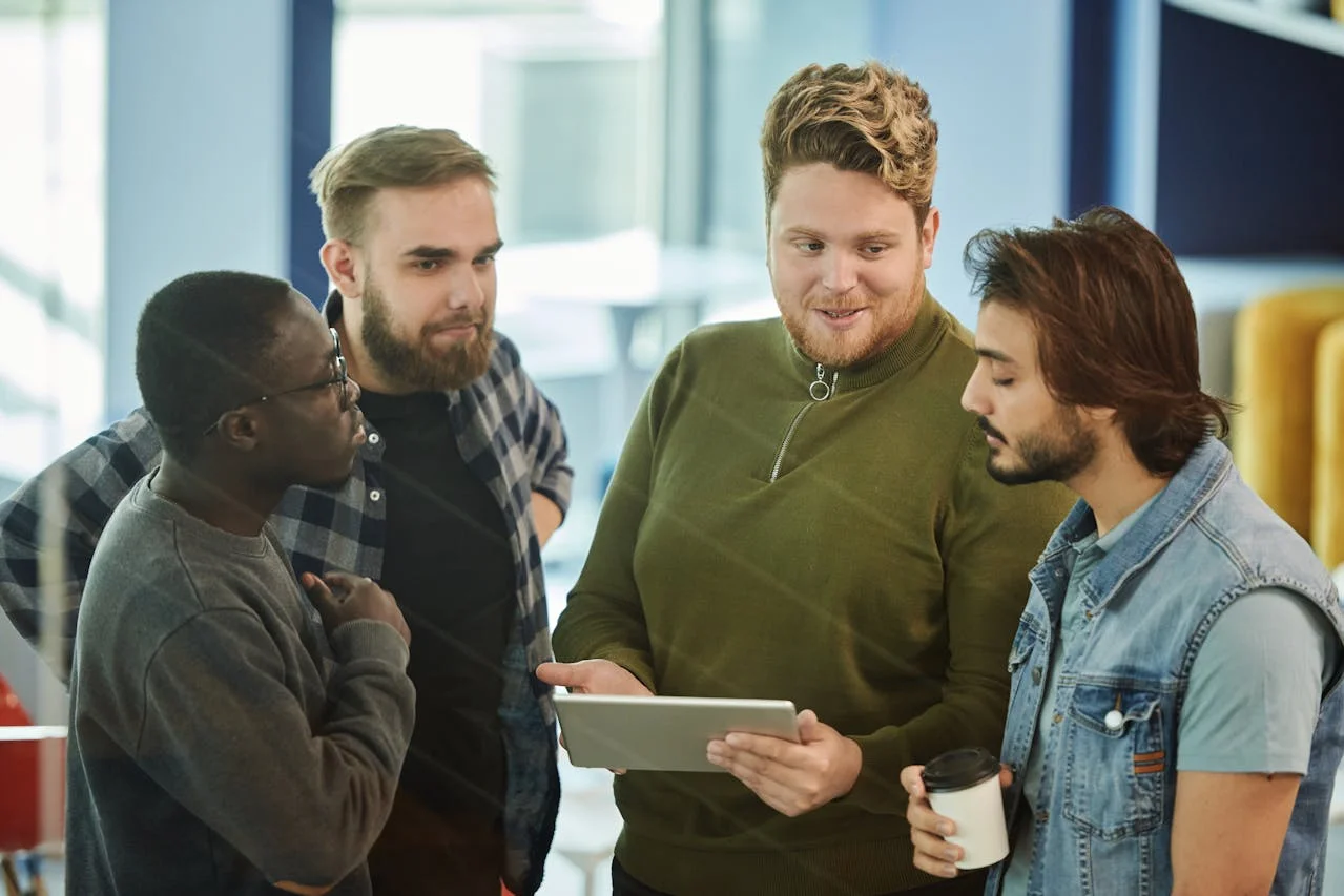 A team collaborates on a PR playbook, symbolizing strategic communication and win-sharing
