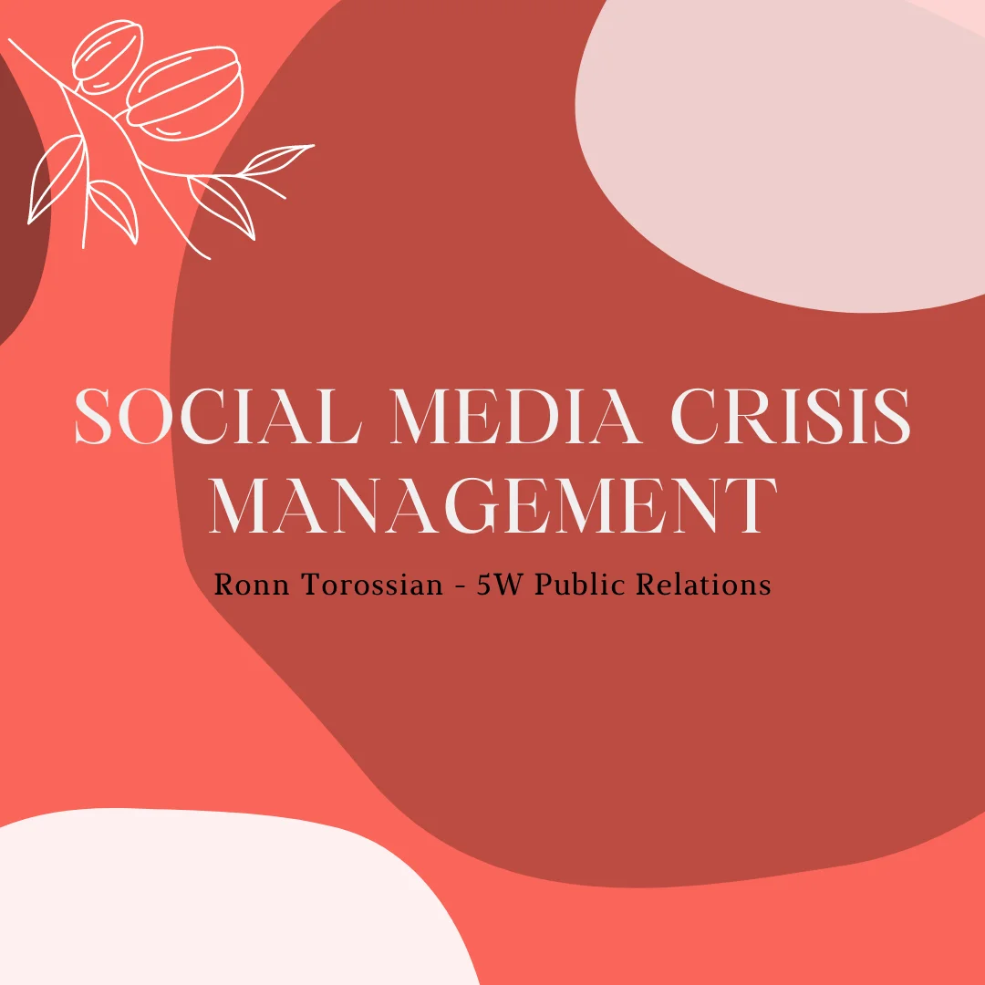 Social media team responding to a brand crisis with a smartphone and laptop