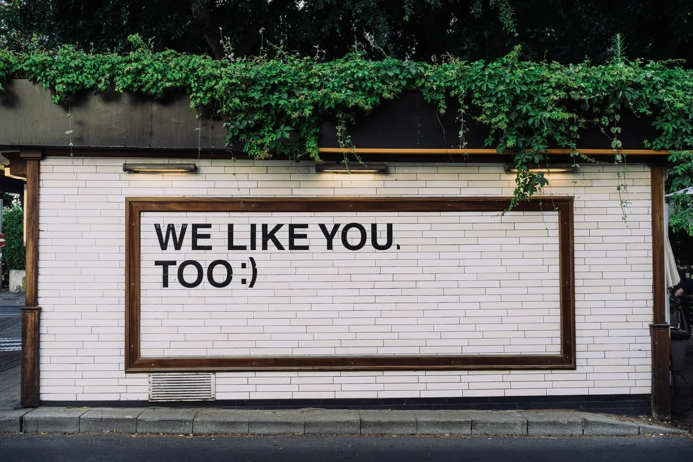 Social media icons emerging from a mobile phone, influencing direct marketing's evolution