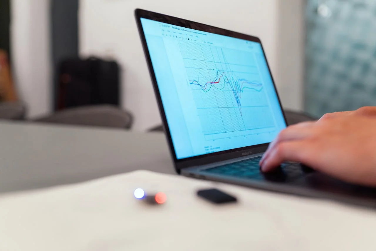 Person using a laptop, illustrating the immediacy of real-time PR monitoring