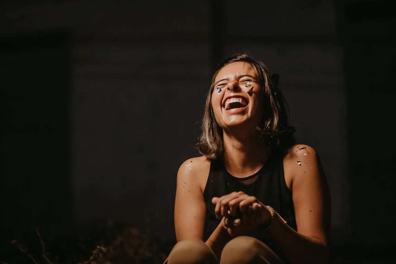 Playful executive giving a thumbs up, showing humor's role in corporate PR