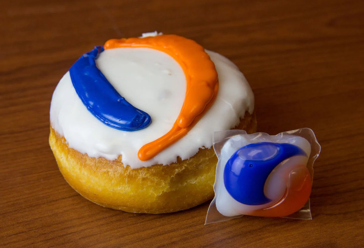 Teenagers eating Tide Pods, demonstrating the viral and dangerous social media challenge
