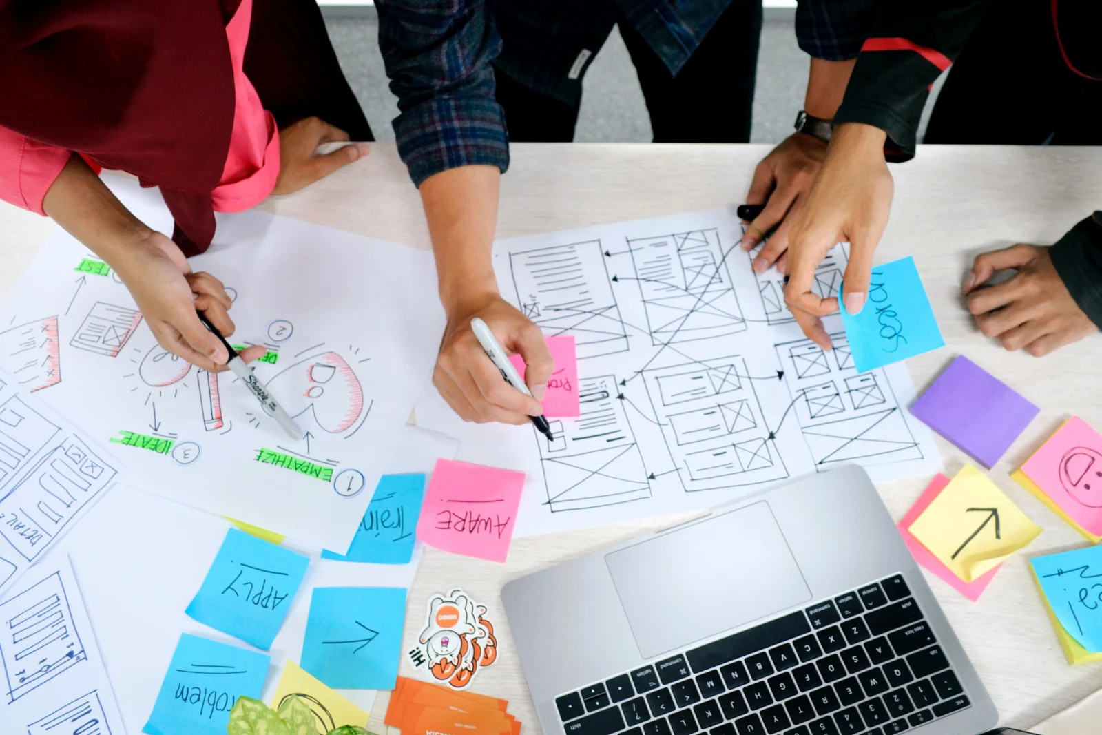 Diverse group of people collaborating, representing customer needs and understanding