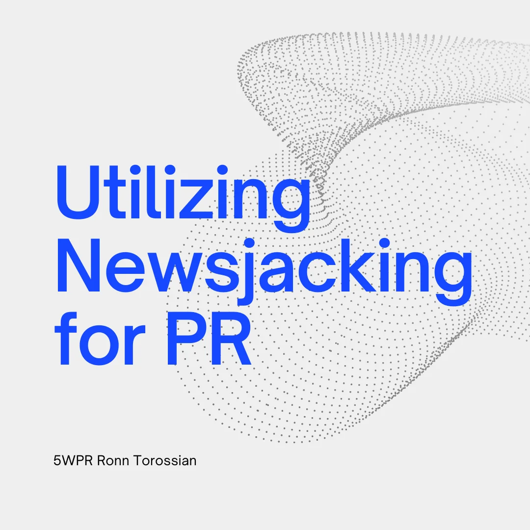 A megaphone broadcasting news headlines, illustrating the concept of newsjacking for public relations