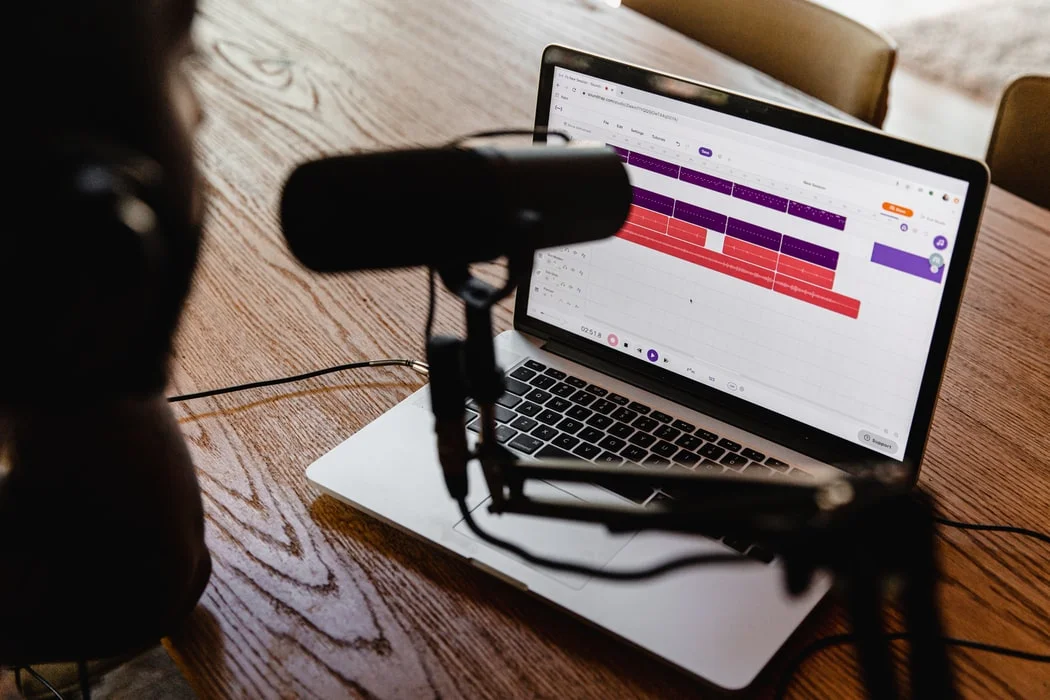 Two people recording a podcast, showcasing a successful PR campaign