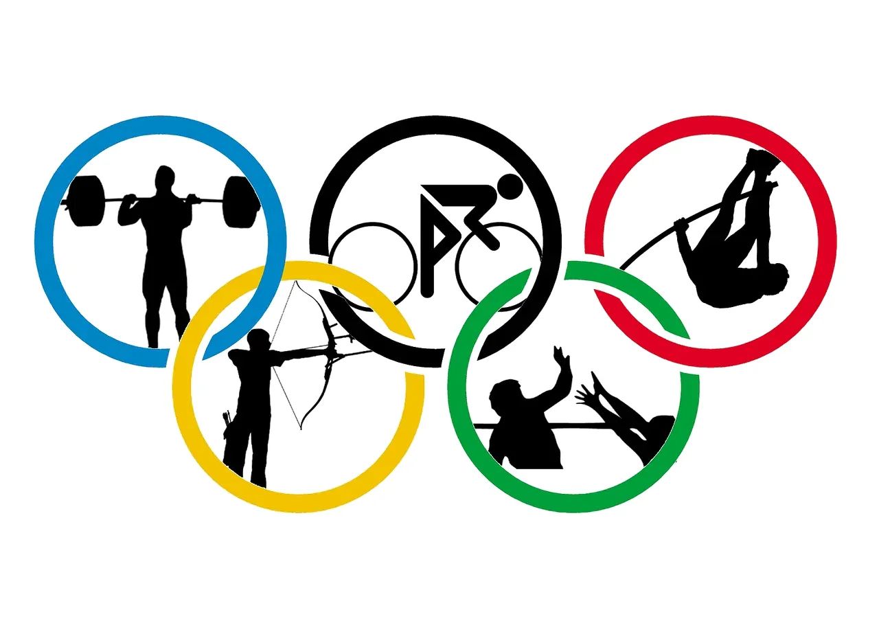 Rio's Olympic rings, viewed over the city skyline, symbolizing potential challenges and preparations