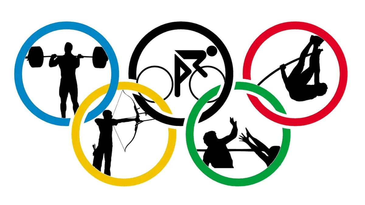Rio's Olympic rings, viewed over the city skyline, symbolizing potential challenges and preparations