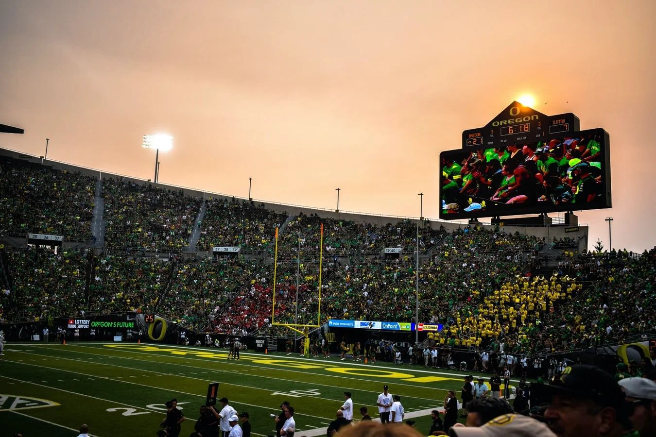 Football stadium filled with cheering fans, ready for the upcoming Big 10 season