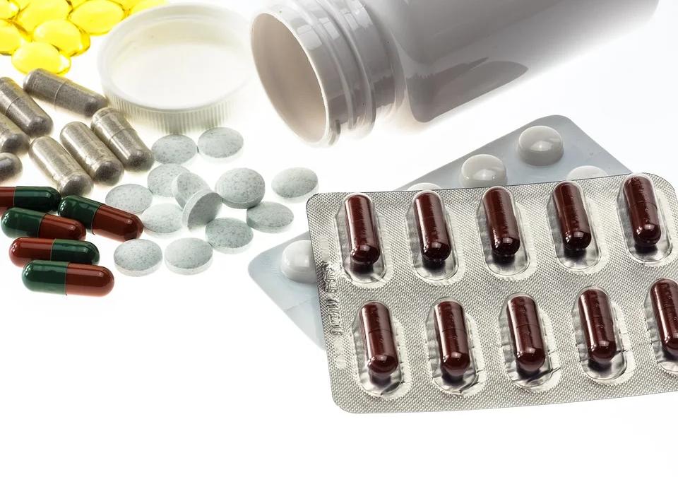 A gavel and pill bottle symbolize the legal accountability for the opioid crisis
