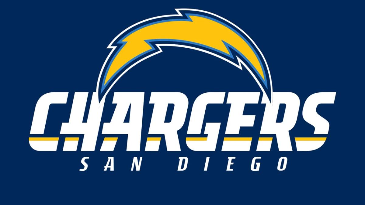 Frustrated Chargers fan watching a game with stadium seats visible