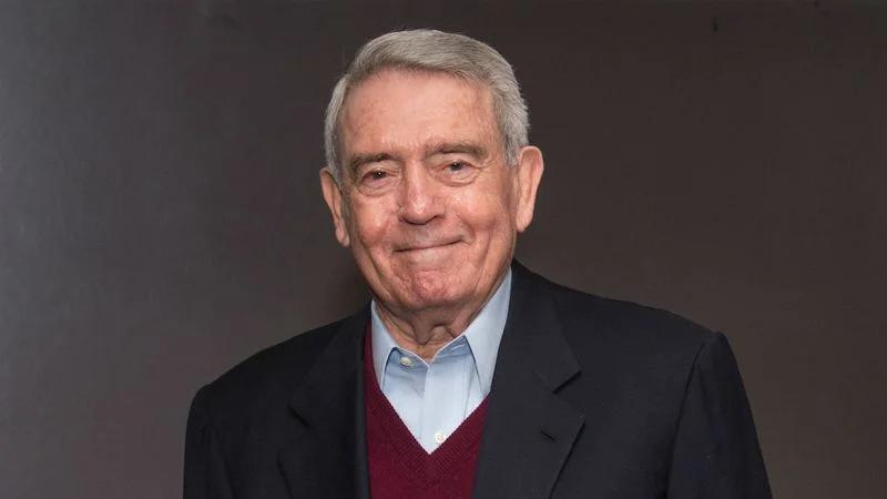Legendary journalist Dan Rather delivering news updates, a career spanning decades