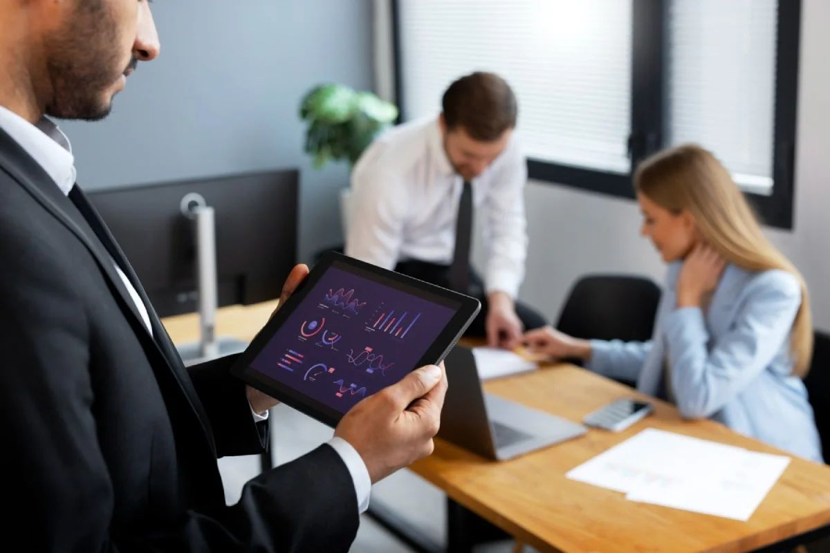 Fintech and PR professionals collaborating at a modern office desk