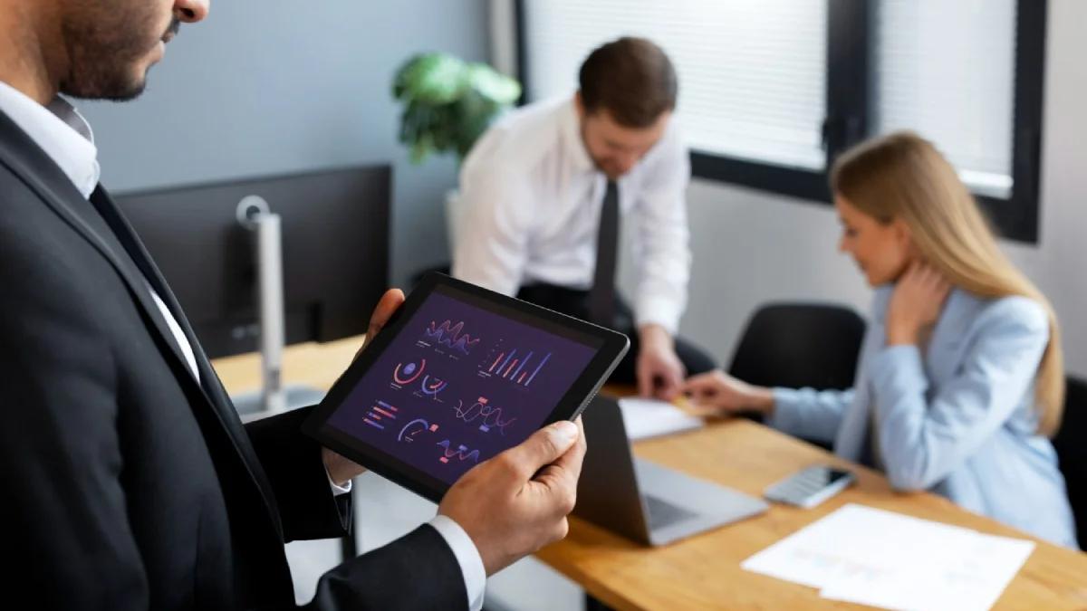Fintech and PR professionals collaborating at a modern office desk