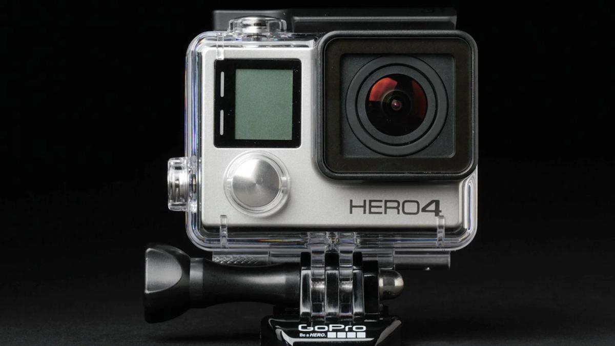 Close-up of a GoPro camera attached to a helmet, showing adventurous POV recording