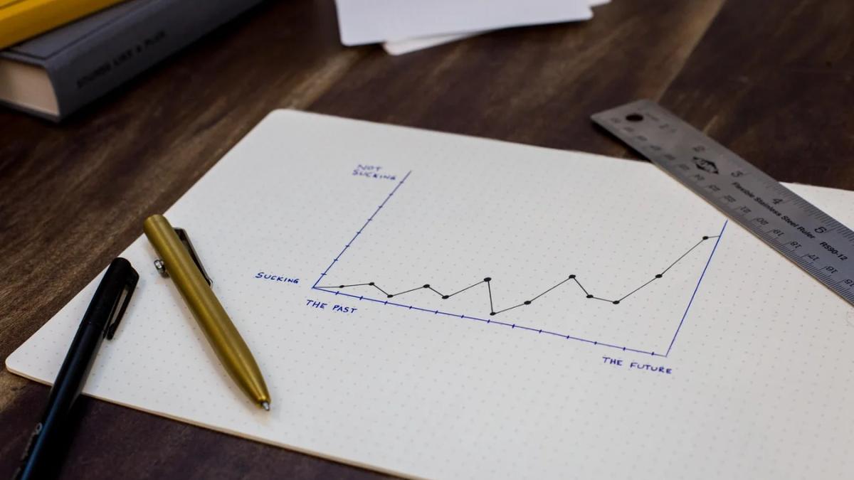 Digital marketing strategist analyzing data to achieve greater success with conversions