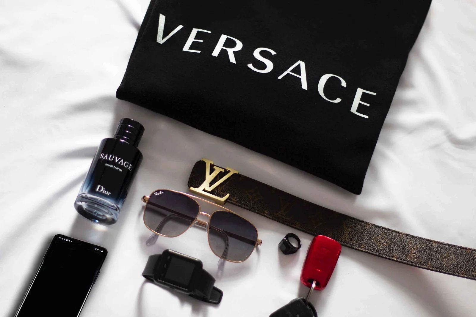Expensive watches and jewelry on a table, illustrating luxury spending during inflation