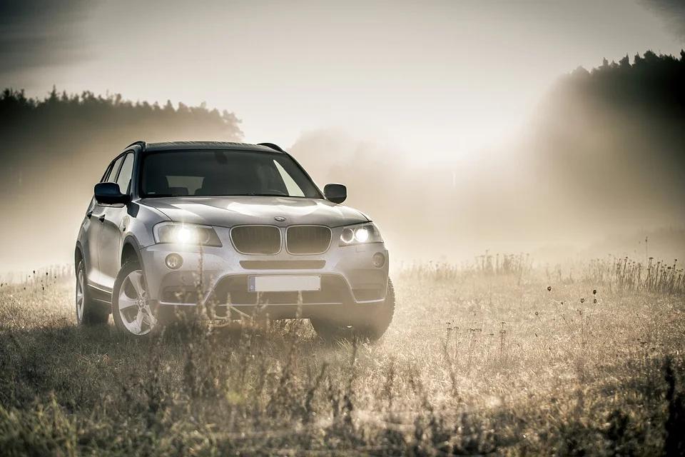 Powerful new luxury SUVs driving on a scenic open road