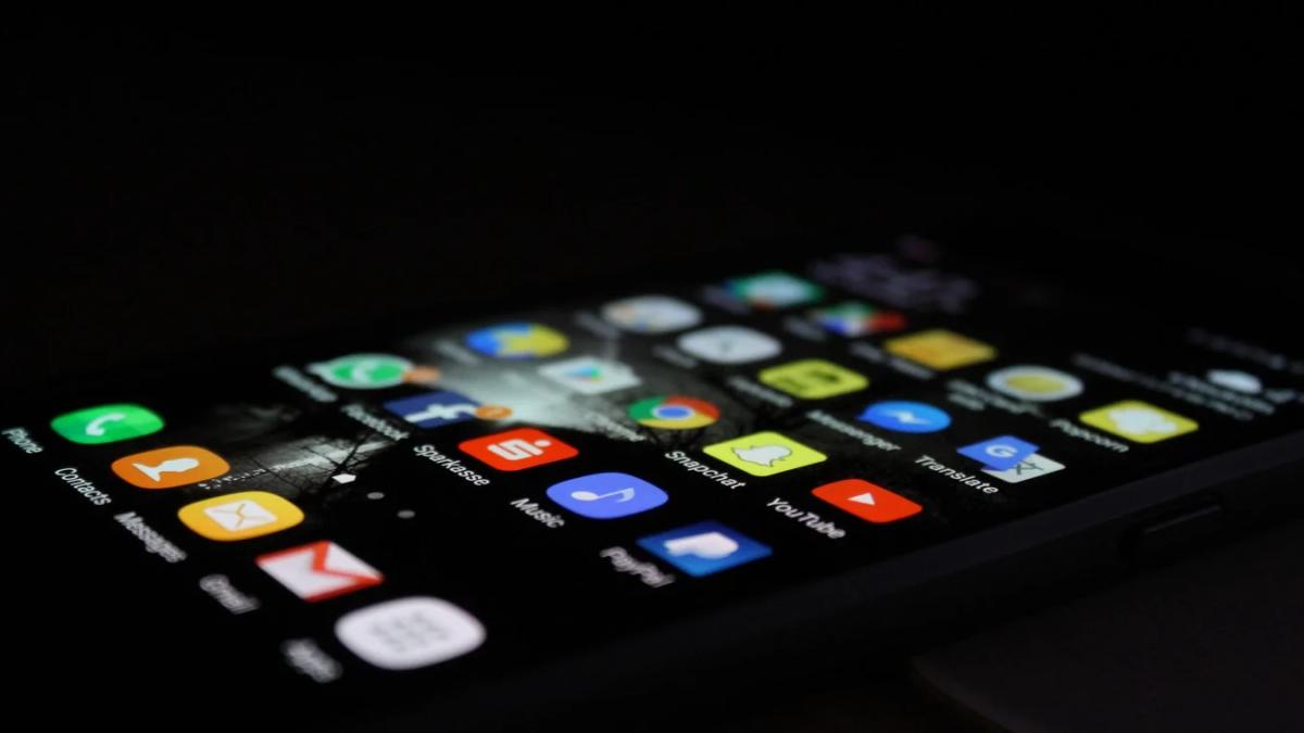 Designer creating visual content for a brand's social media launch strategy