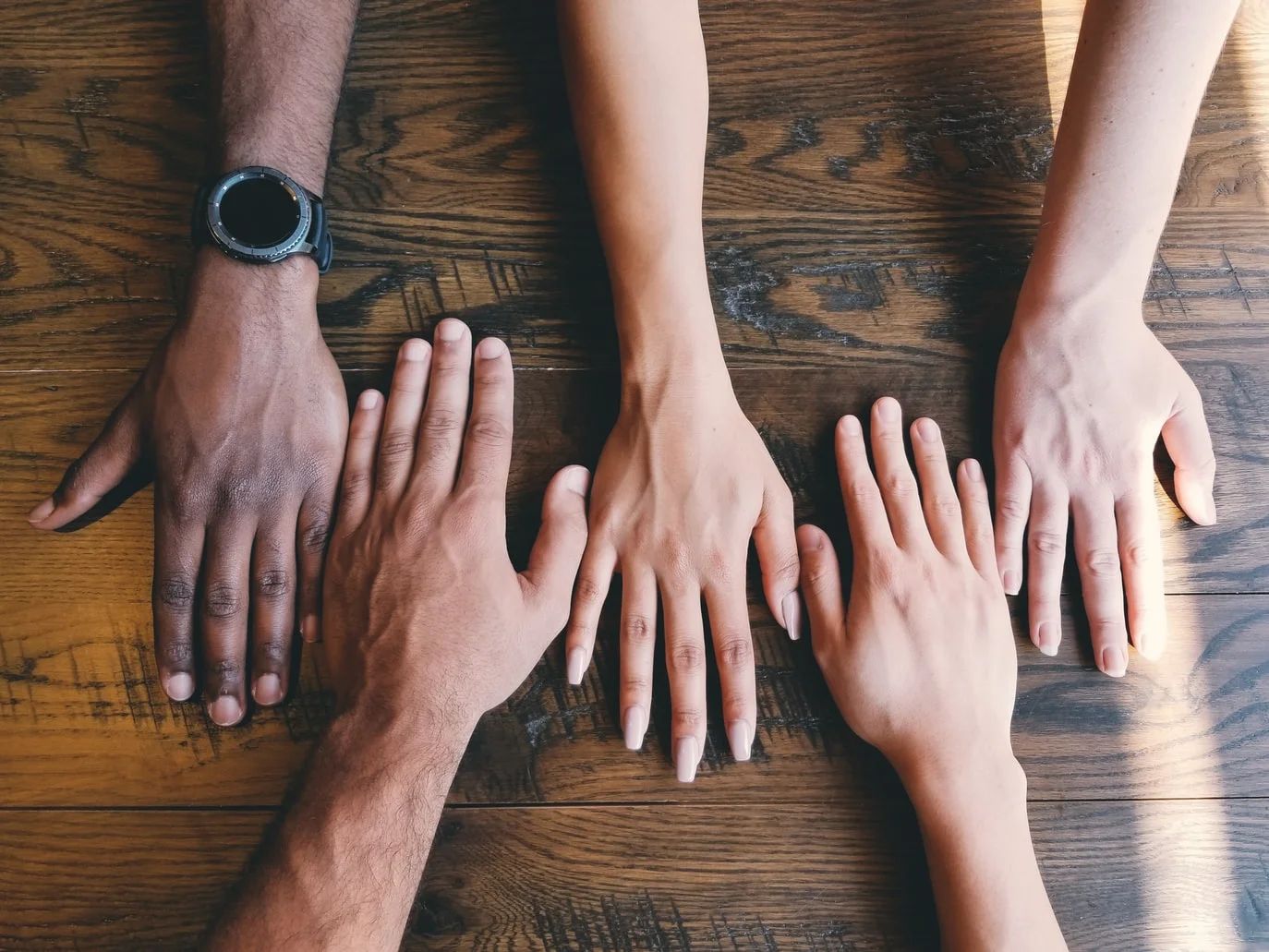 Diverse people collaborating globally, representing multicultural marketing strategies