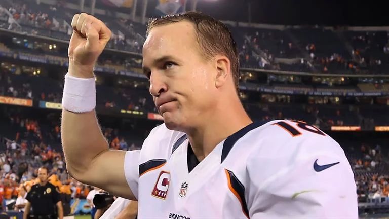 Peyton Manning waves to crowd, reflecting on career amidst recent controversy