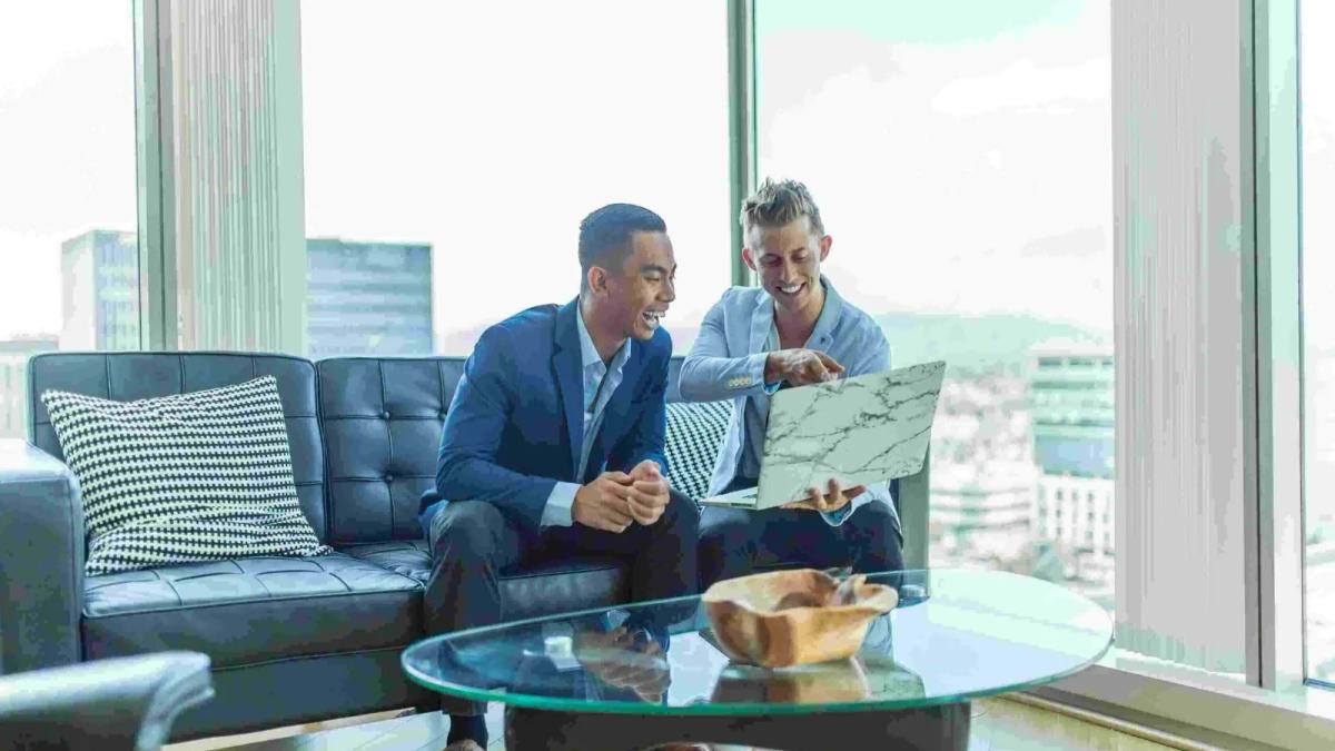 People shaking hands showing positive investor relations and strategic communication