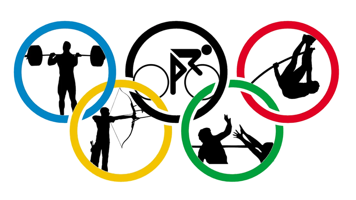 Rio's Olympic rings, viewed over the city skyline, symbolizing potential challenges and preparations