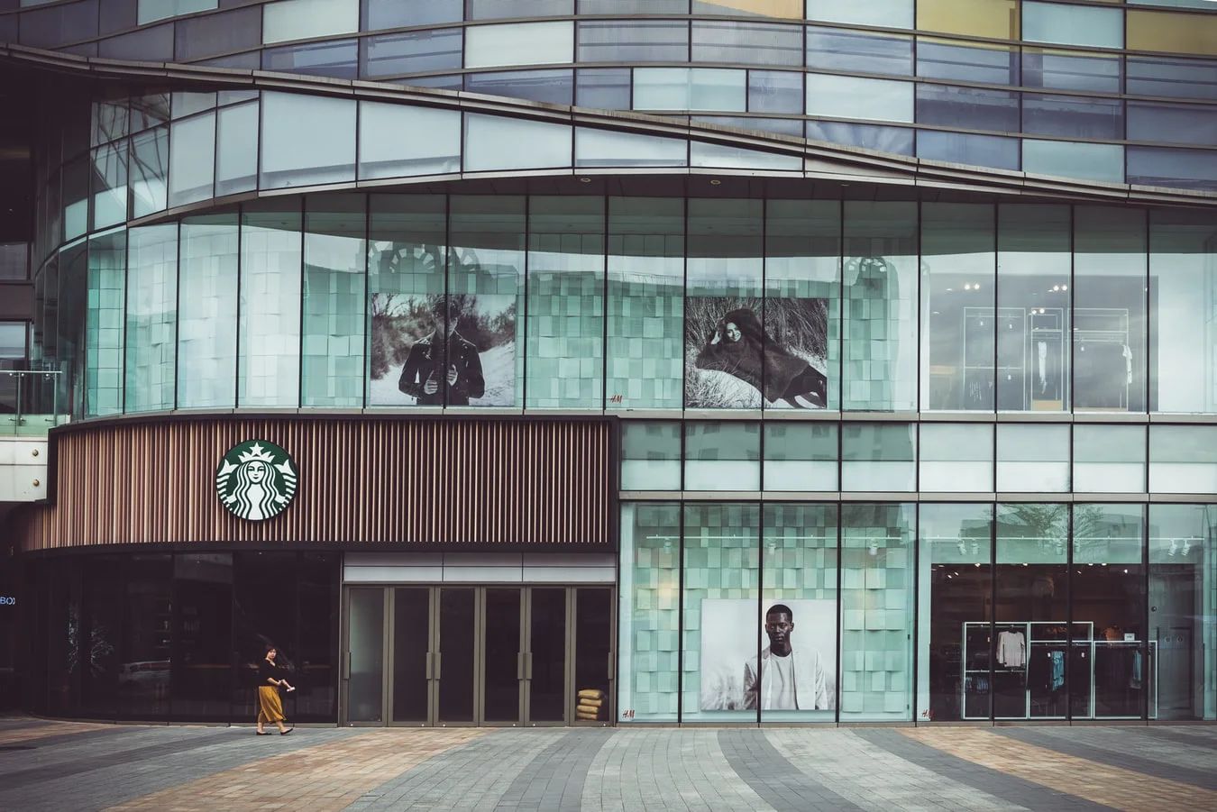 Starbucks app on a smartphone, connecting customers globally, fostering loyalty digitally