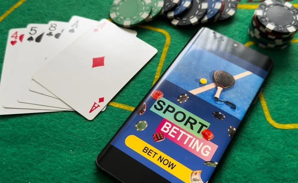 Person looking perplexed at hands holding money, symbolizing marketing budget strategies