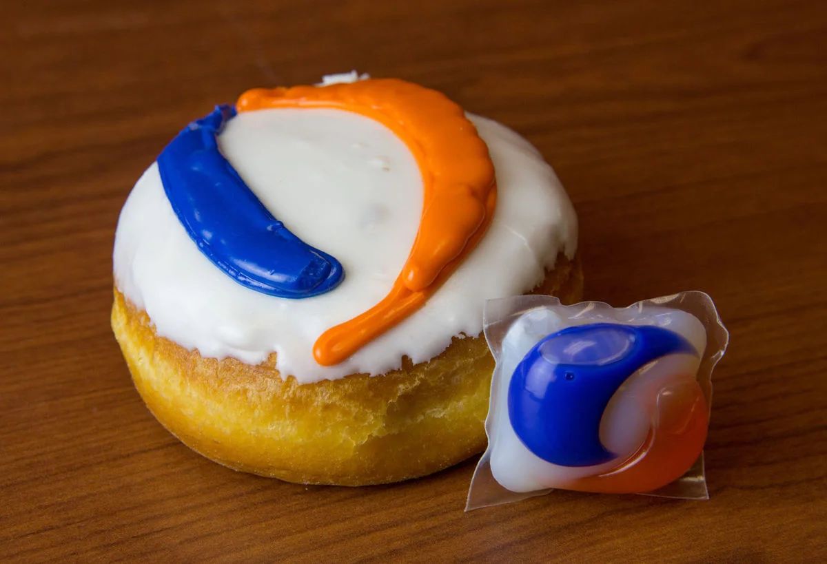 Teenagers eating Tide Pods, demonstrating the viral and dangerous social media challenge